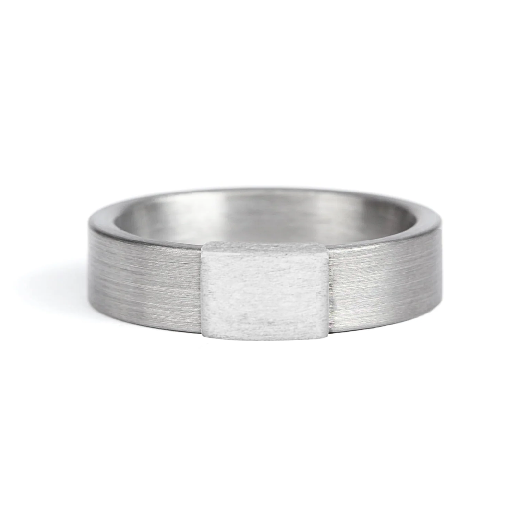 a rugged men's wedding ring crafted from an authentic shotgun barrel. Made in the USA, this unique ring is designed for hunters and outdoorsmen who live for the hunt. A perfect symbol of commitment with an edge of adventure.