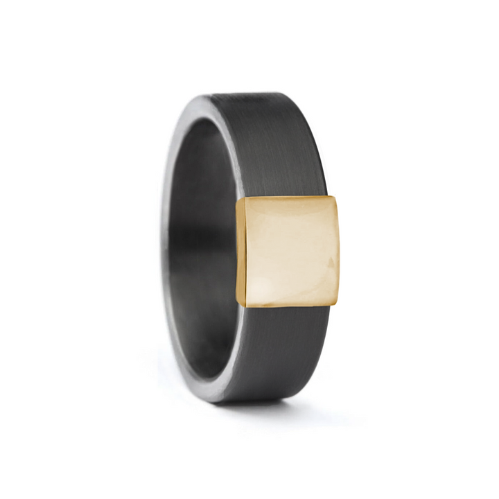 a rugged men's wedding ring crafted from an authentic shotgun barrel. Made in the USA, this unique ring is designed for hunters and outdoorsmen who live for the hunt. A perfect symbol of commitment with an edge of adventure.