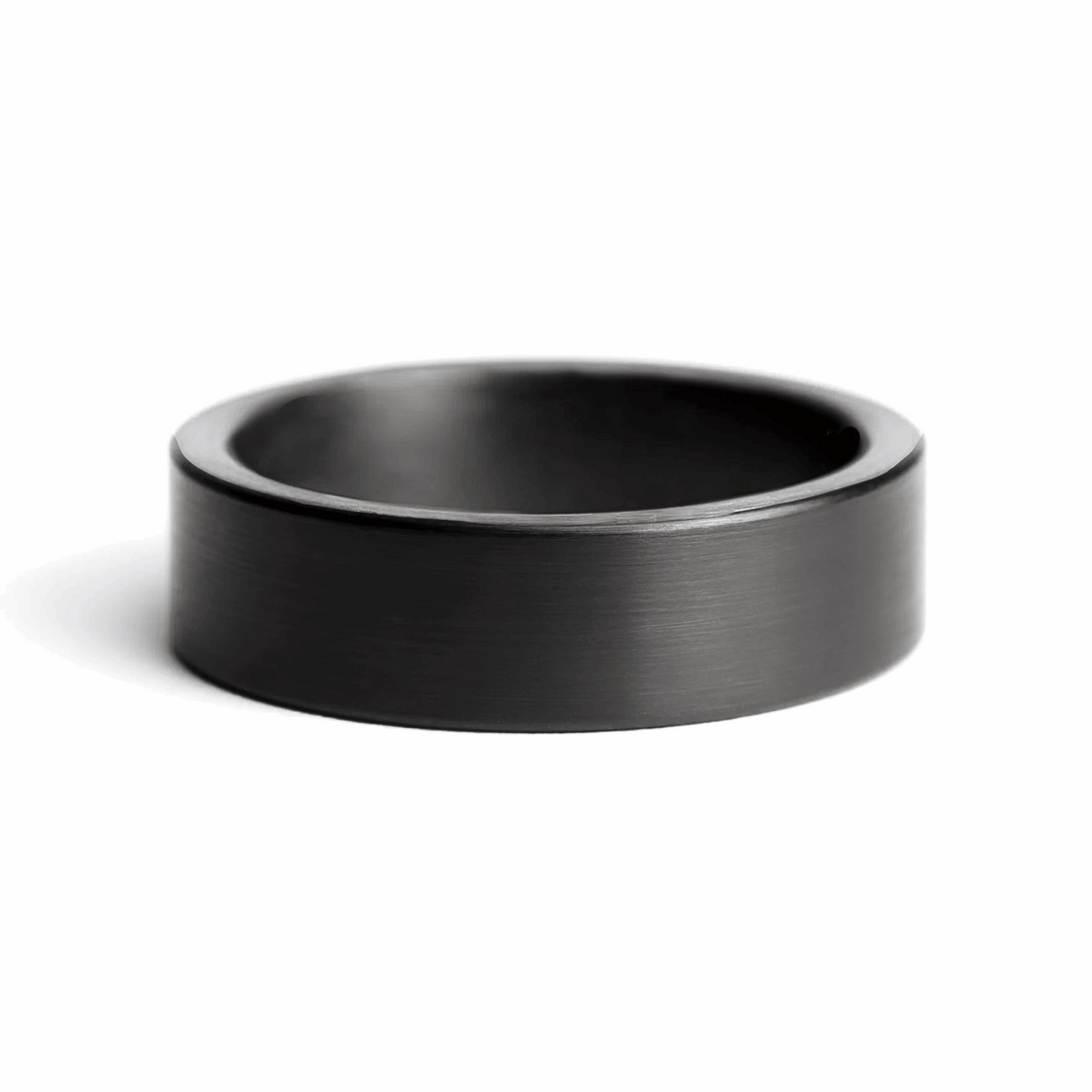a rugged men's wedding ring crafted from an authentic shotgun barrel. Made in the USA, this unique ring is designed for hunters and outdoorsmen who live for the hunt. A perfect symbol of commitment with an edge of adventure.