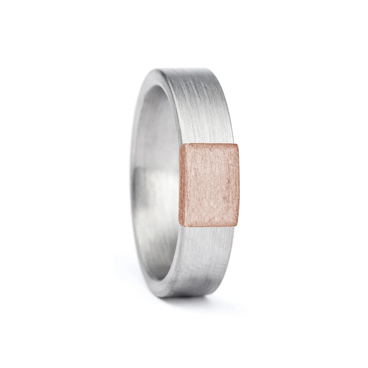 a rugged men's wedding ring crafted from an authentic shotgun barrel. Made in the USA, this unique ring is designed for hunters and outdoorsmen who live for the hunt. A perfect symbol of commitment with an edge of adventure.
