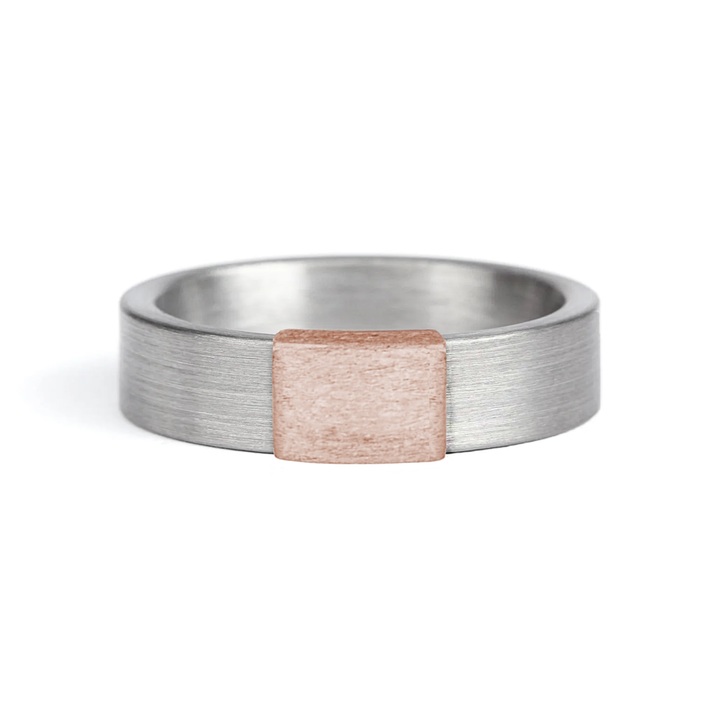 a rugged men's wedding ring crafted from an authentic shotgun barrel. Made in the USA, this unique ring is designed for hunters and outdoorsmen who live for the hunt. A perfect symbol of commitment with an edge of adventure.
