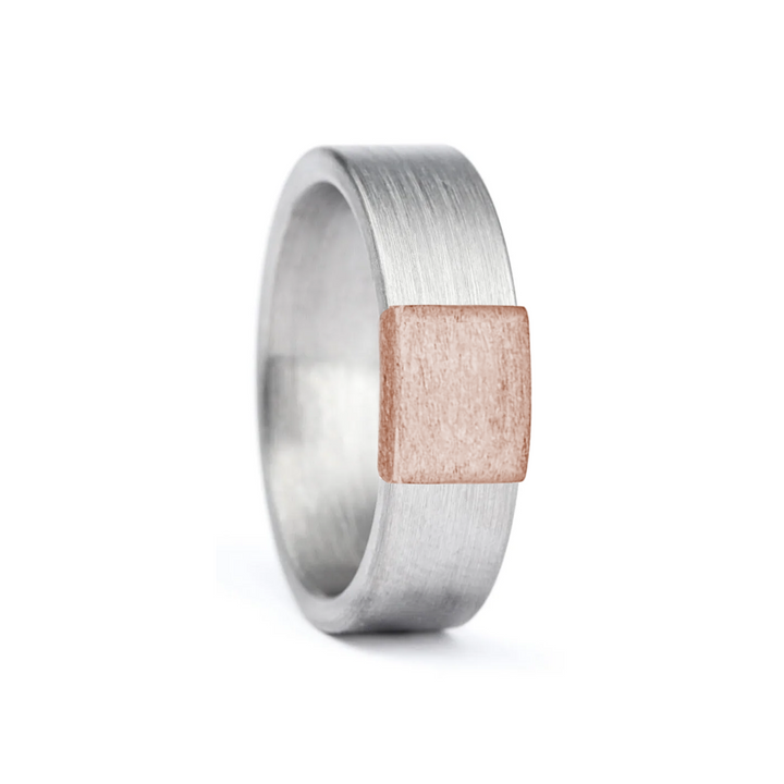 a rugged men's wedding ring crafted from an authentic shotgun barrel. Made in the USA, this unique ring is designed for hunters and outdoorsmen who live for the hunt. A perfect symbol of commitment with an edge of adventure.
