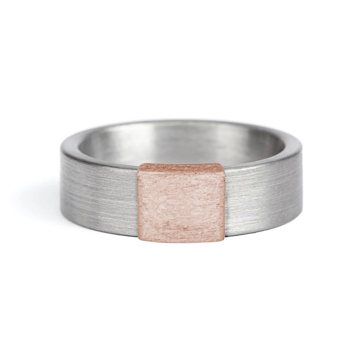 a rugged men's wedding ring crafted from an authentic shotgun barrel. Made in the USA, this unique ring is designed for hunters and outdoorsmen who live for the hunt. A perfect symbol of commitment with an edge of adventure.
