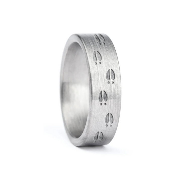 a rugged men's wedding ring crafted from an authentic shotgun barrel. Made in the USA, this unique ring is designed for hunters and outdoorsmen who live for the hunt. A perfect symbol of commitment with an edge of adventure.
