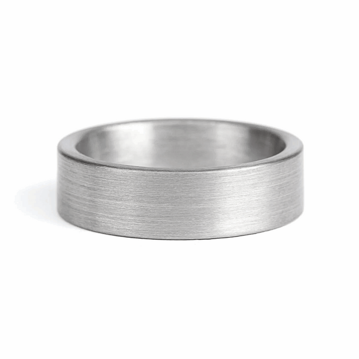 a rugged men's wedding ring crafted from an authentic shotgun barrel. Made in the USA, this unique ring is designed for hunters and outdoorsmen who live for the hunt. A perfect symbol of commitment with an edge of adventure.
