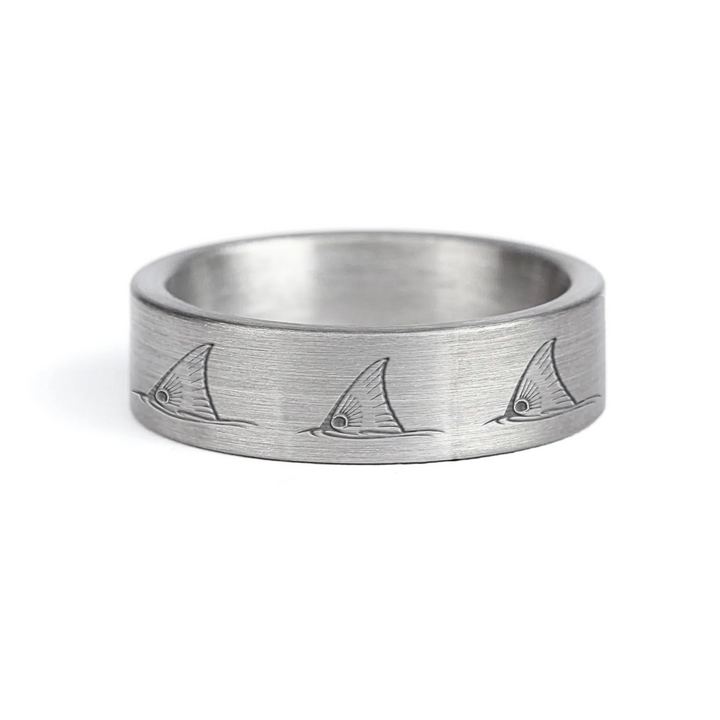 a rugged men's wedding ring crafted from an authentic shotgun barrel. Made in the USA, this unique ring is designed for hunters and outdoorsmen who live for the hunt. A perfect symbol of commitment with an edge of adventure.
