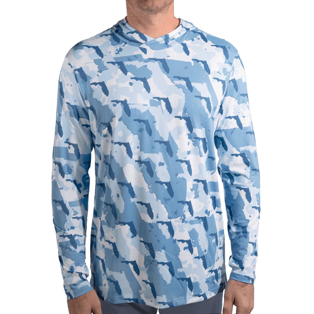 Florida Camo Fishing Long Sleeve Hoodie featuring a unique camouflage pattern made from the outline of the state of Florida . Designed for anglers, hunters, and proud Floridians this lightweight, breathable hoodie offers UV protection and moisture-wicking fabric—perfect for fishing trips, outdoor adventures, and everyday wear.
