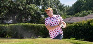 Man playing golf wearing Georgia Camo Gamdeday Polo