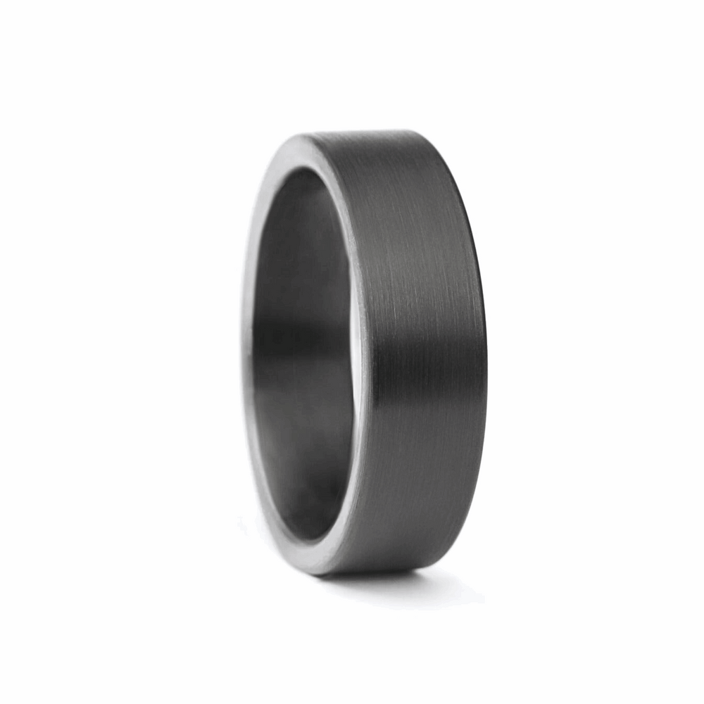 a rugged men's wedding ring crafted from an authentic shotgun barrel. Made in the USA, this unique ring is designed for hunters and outdoorsmen who live for the hunt. A perfect symbol of commitment with an edge of adventure.
