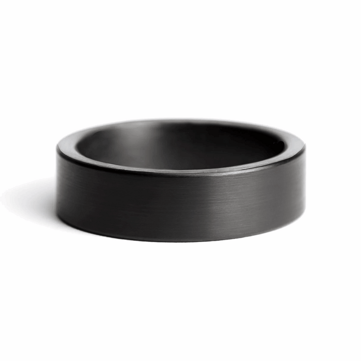 a rugged men's wedding ring crafted from an authentic shotgun barrel. Made in the USA, this unique ring is designed for hunters and outdoorsmen who live for the hunt. A perfect symbol of commitment with an edge of adventure.
