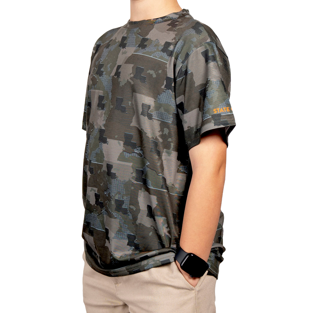 Kid’s Louisiana Camo short sleeve shirt featuring a unique camouflage pattern made from the outline of the state of Louisiana. Lightweight, breathable, and perfect for hunting, hiking, or everyday wear.