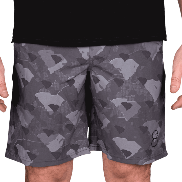 South Carolina State Camo Everyday Shorts featuring a one-of-a-kind camo pattern made from the outline of South Carolina  Designed for versatility, these lightweight men's shorts are perfect for running, swimming, workouts, and everyday wear. A must-have for South Carolina hunters and outdoor enthusiasts who want to rep their state with pride.