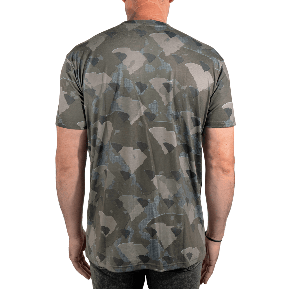 Men’s South Carolina Camo short sleeve shirt featuring a unique camouflage pattern made from the outline of the state of South Carolina Lightweight, breathable, and perfect for hunting, hiking, or everyday wear.
