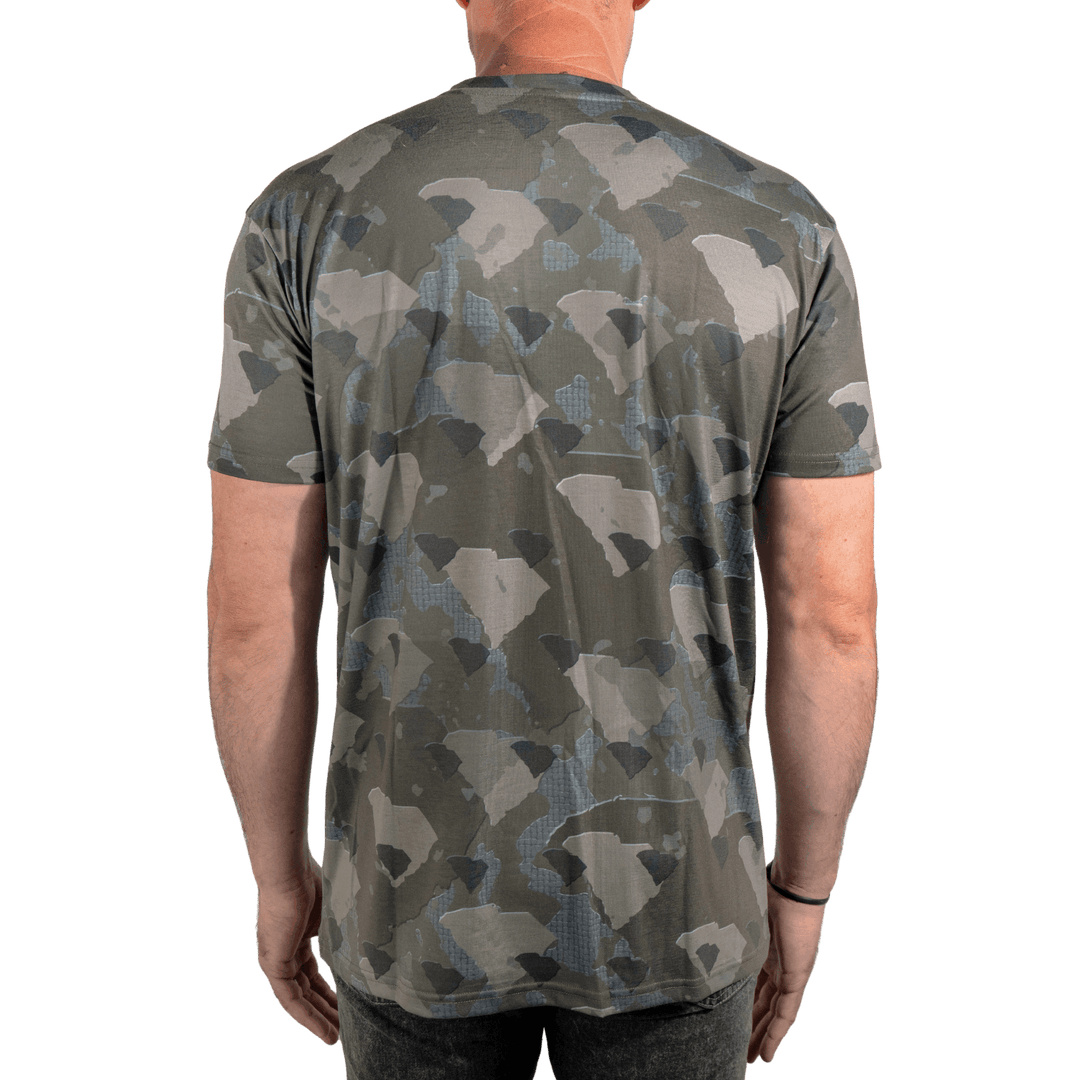 Men’s South Carolina Camo short sleeve shirt featuring a unique camouflage pattern made from the outline of the state of South Carolina Lightweight, breathable, and perfect for hunting, hiking, or everyday wear.
