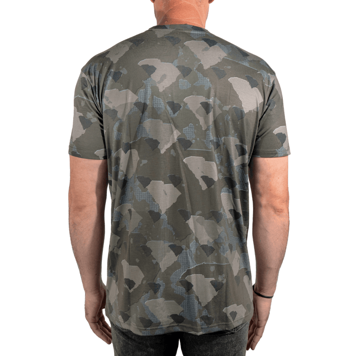 Men’s South Carolina Camo short sleeve shirt featuring a unique camouflage pattern made from the outline of the state of South Carolina Lightweight, breathable, and perfect for hunting, hiking, or everyday wear.