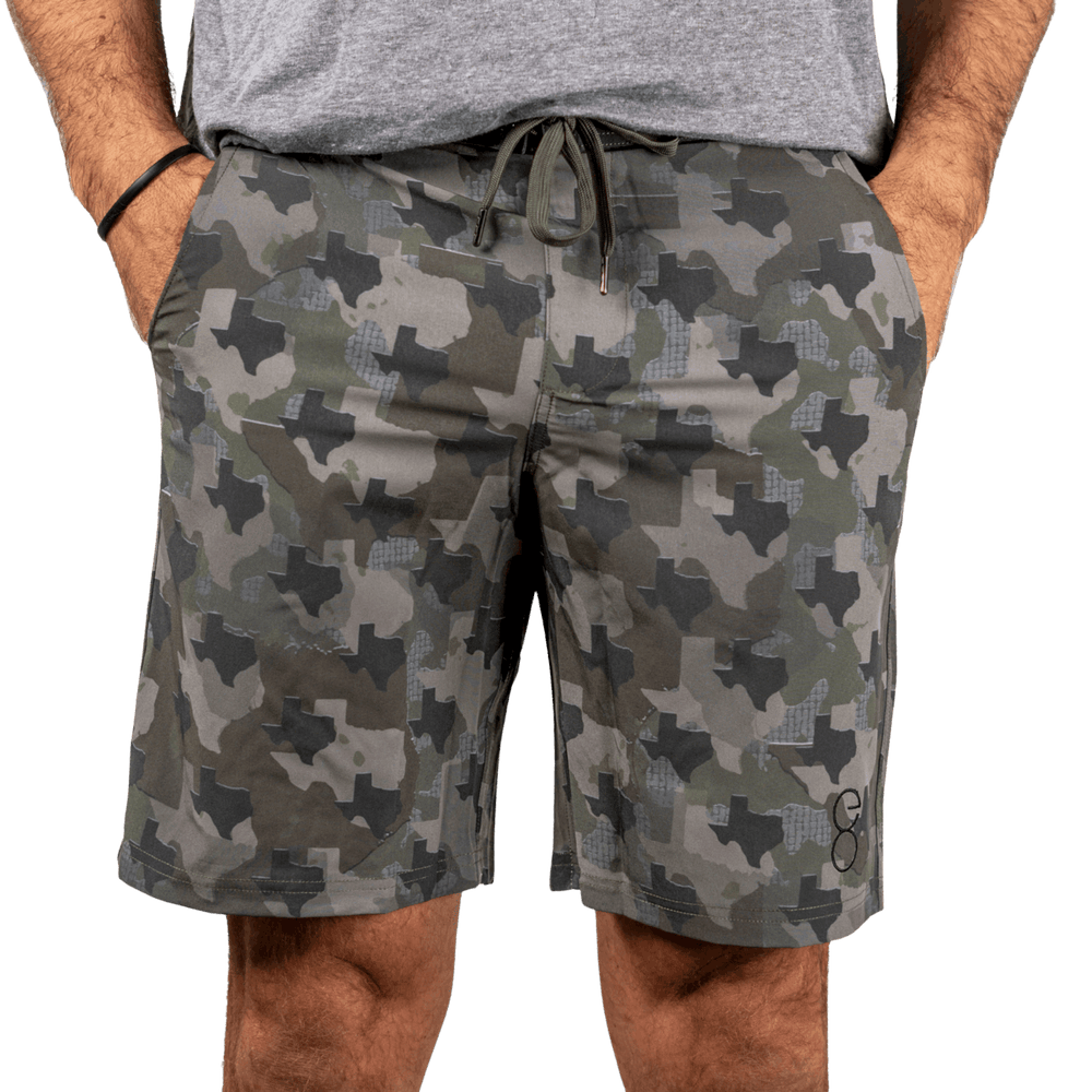 Texas State Camo Everyday Shorts featuring a one-of-a-kind camo pattern made from the outline of Texas.  Designed for versatility, these lightweight men's shorts are perfect for running, swimming, workouts, and everyday wear. A must-have for Texas hunters and outdoor enthusiasts who want to rep their state with pride.