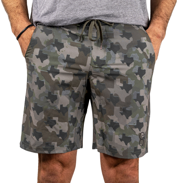 Texas State Camo Everyday Shorts featuring a one-of-a-kind camo pattern made from the outline of Texas.  Designed for versatility, these lightweight men's shorts are perfect for running, swimming, workouts, and everyday wear. A must-have for Texas hunters and outdoor enthusiasts who want to rep their state with pride.