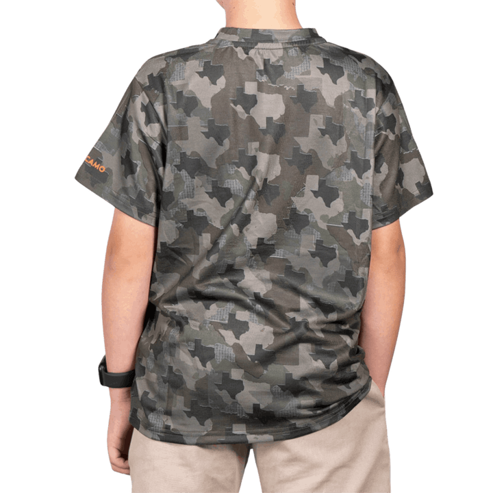 Kid’s Texas Camo short sleeve shirt featuring a unique camouflage pattern made from the outline of the state of Texas Lightweight, breathable, and perfect for hunting, hiking, or everyday wear.