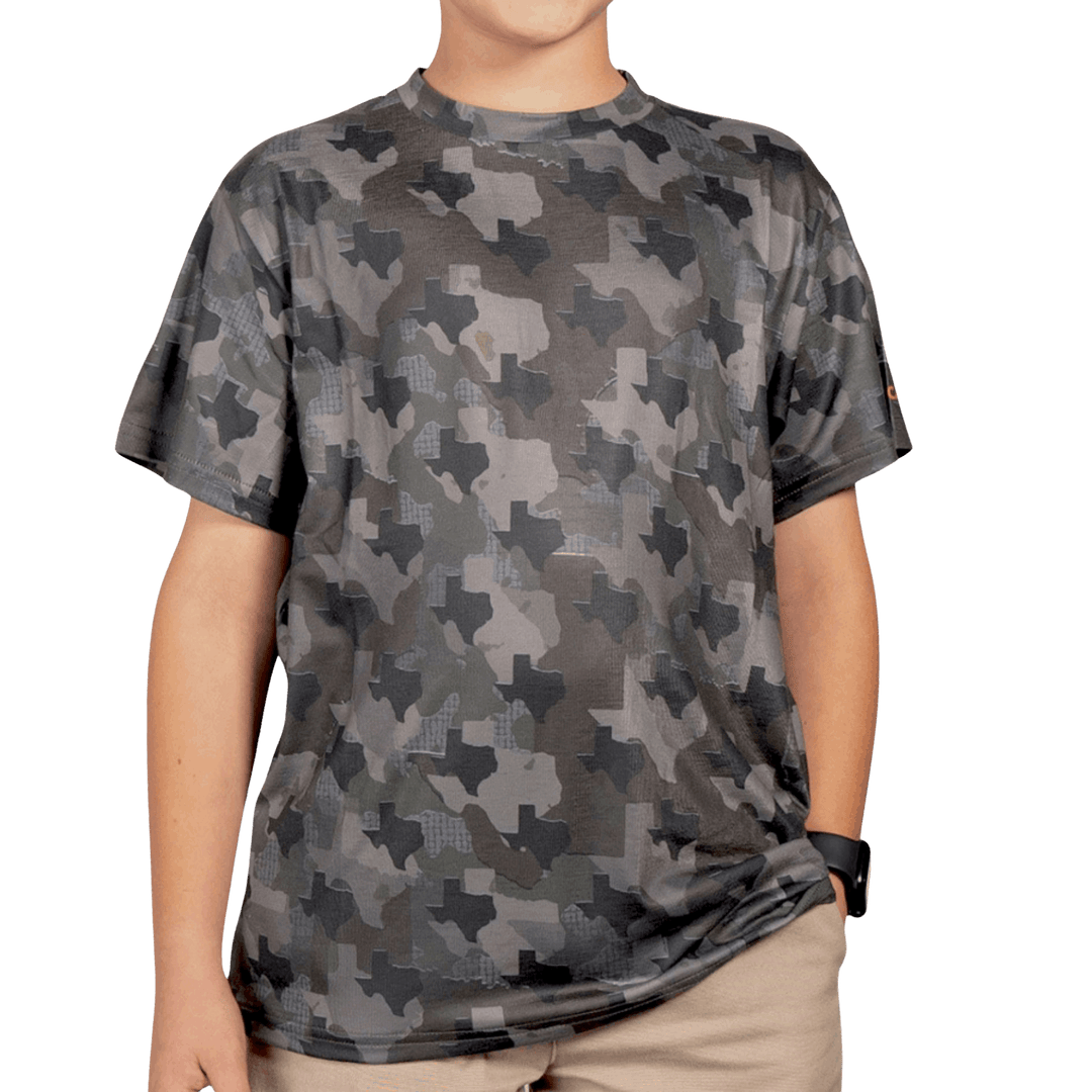 Kid’s Texas Camo short sleeve shirt featuring a unique camouflage pattern made from the outline of the state of Texas Lightweight, breathable, and perfect for hunting, hiking, or everyday wear.
