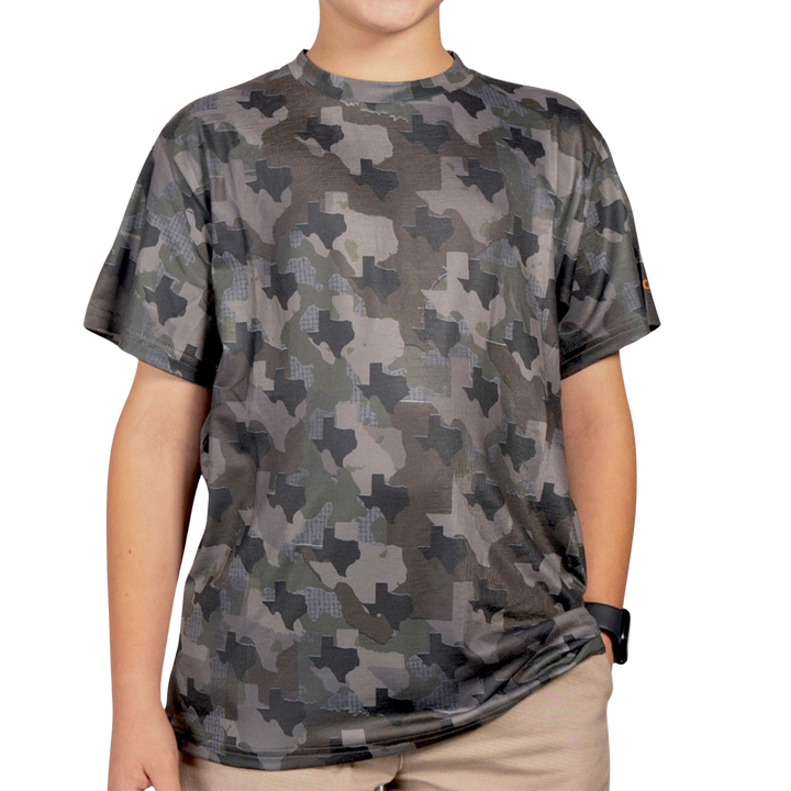 Kid’s Texas Camo short sleeve shirt featuring a unique camouflage pattern made from the outline of the state of Texas Lightweight, breathable, and perfect for hunting, hiking, or everyday wear.