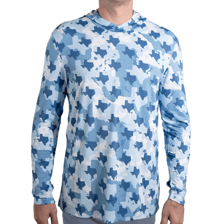 Texas Camo Fishing Long Sleeve Hoodie featuring a unique camouflage pattern made from the outline of the state of Texas. Designed for anglers, hunters, and proud Texans, this lightweight, breathable hoodie offers UV protection and moisture-wicking fabric—perfect for fishing trips, outdoor adventures, and everyday wear.
