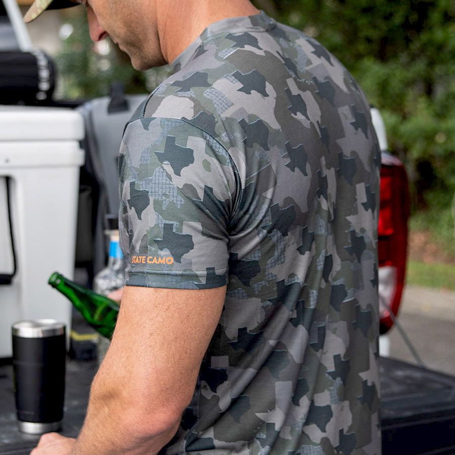 Men’s Texas Camo short sleeve shirt featuring a unique camouflage pattern made from the outline of the state of Texas Lightweight, breathable, and perfect for hunting, hiking, or everyday wear.